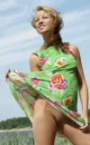 ST18_CLIANTHA_M_CLIANTHA_-_FLOWER_DRESS_AND_SAND_8.webp