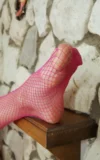 ST18_MELENA_A_MELENA_-_PINK_FISHNET_STOCKINGS_3.webp