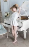 ST18_MIA_B_MIA_AT_THE_WHITE_PIANO_19.webp