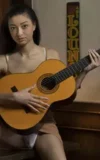 MA_SCARLETT_BLOOM_GUITAR_HERO_11.webp