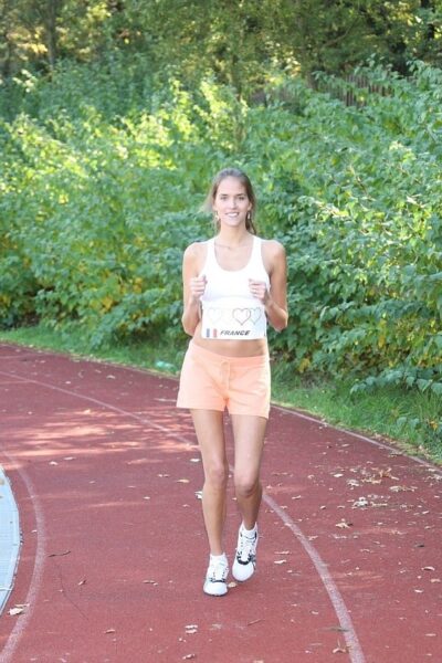 Silvie doing some running on a track field (85) TD