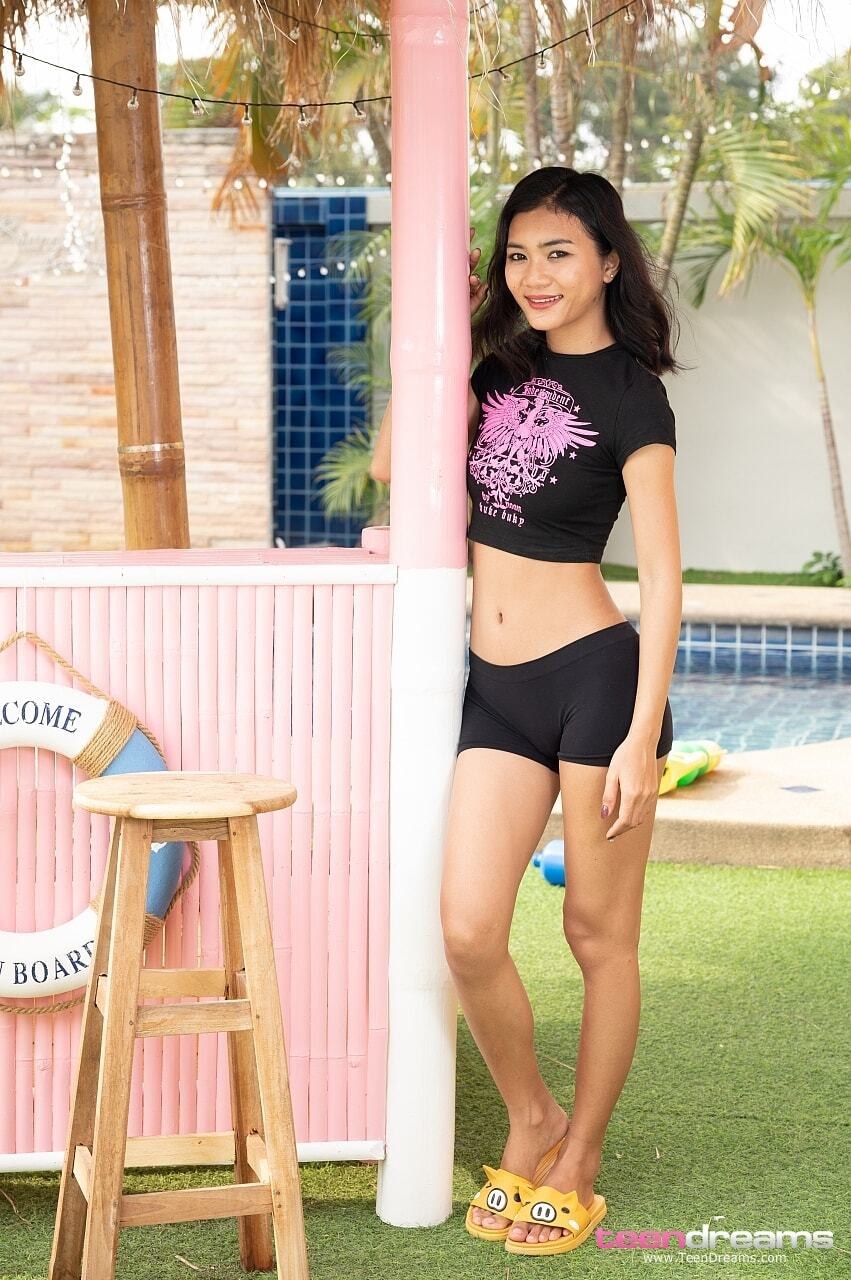 Yori in black shorts enjoying the patio (105) TD